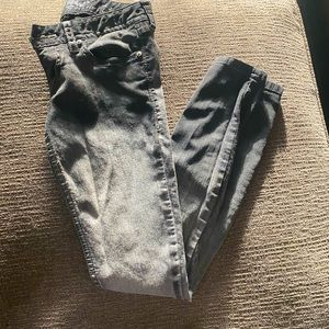 Black faded Stretchy Jeans with decorative pockets